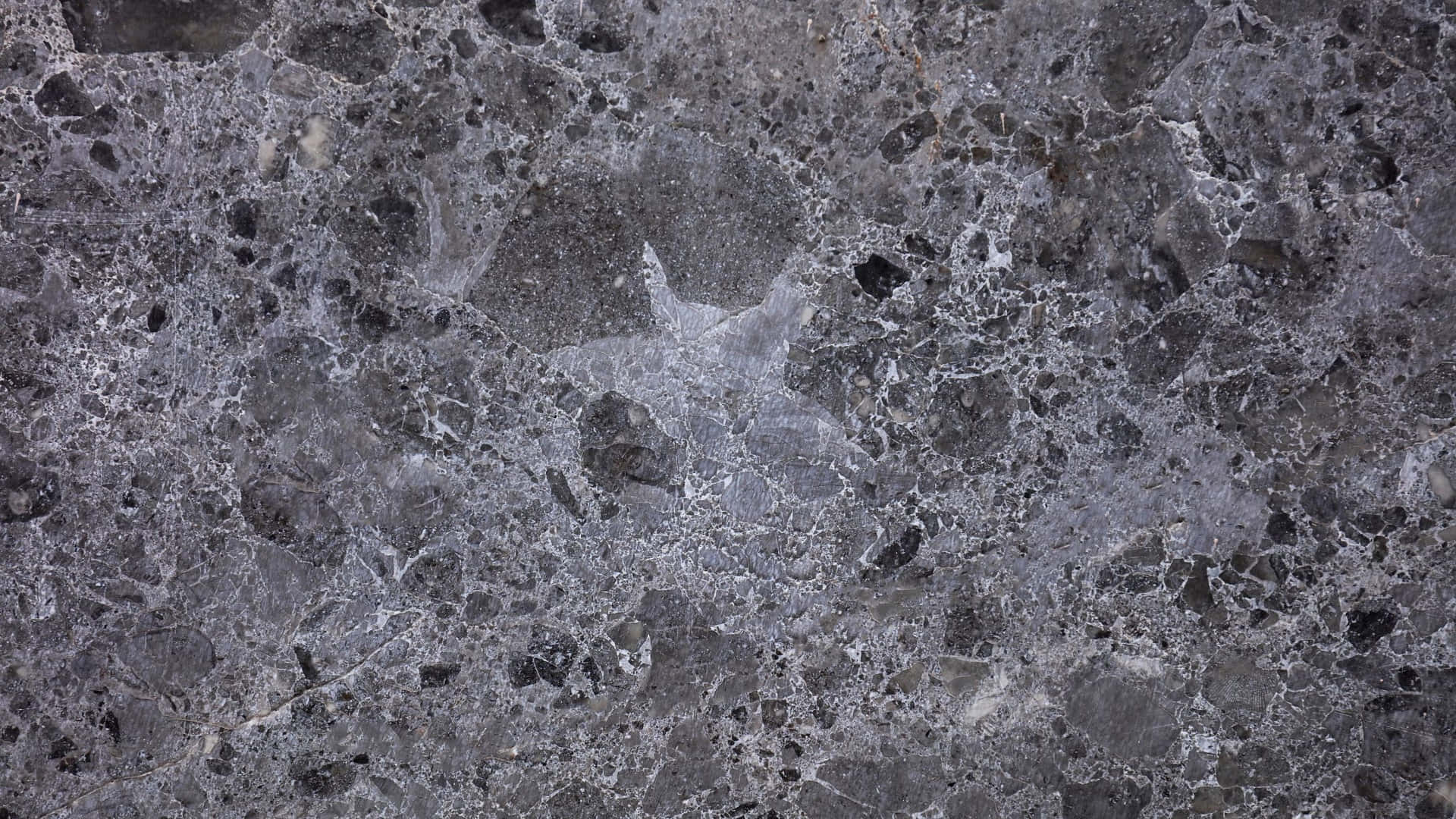 A Close Up Of A Gray Marble