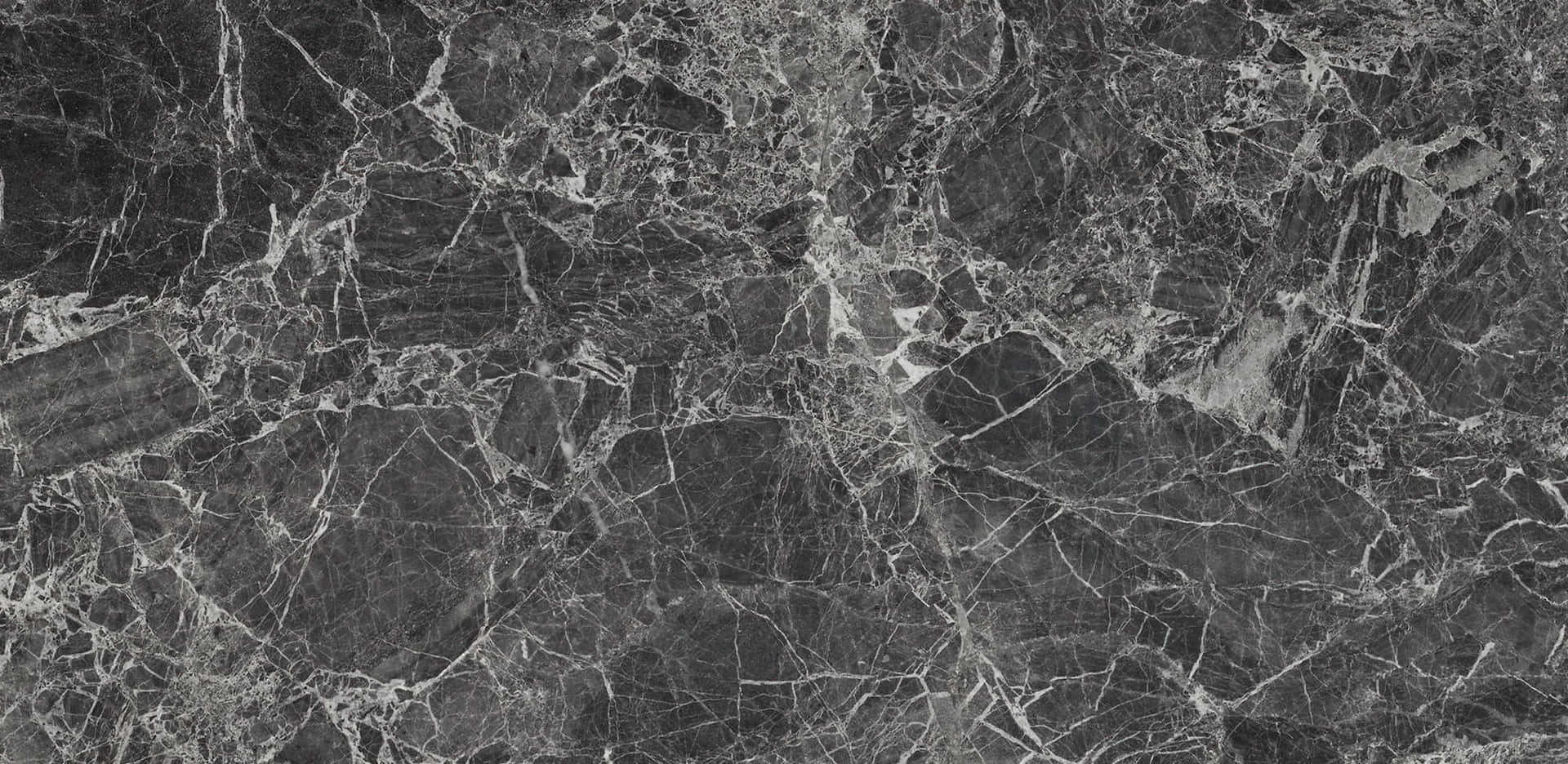Et nærbillede af en sort marmoroverflade Wallpaper