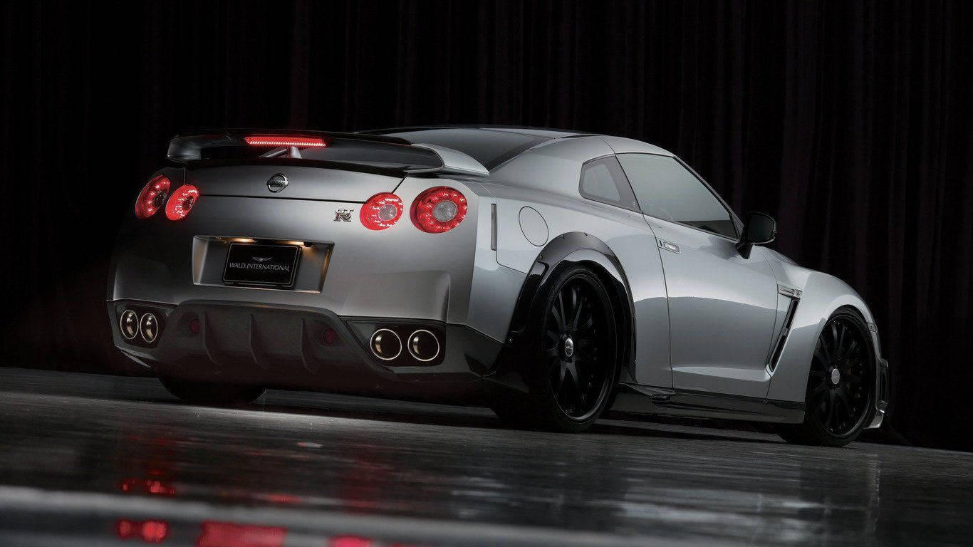 Majestic Stormy Grey Nissan GTR Exudes Power and Precision Wallpaper