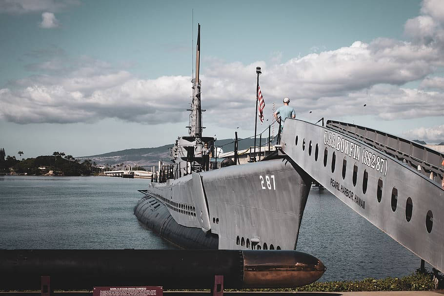 Grey Pearl Harbor Warship On Dock Wallpaper