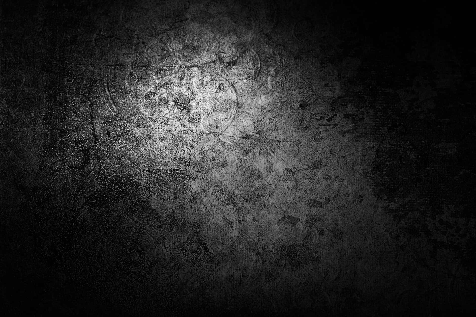 A Black And White Background With A Light Shining On It Wallpaper