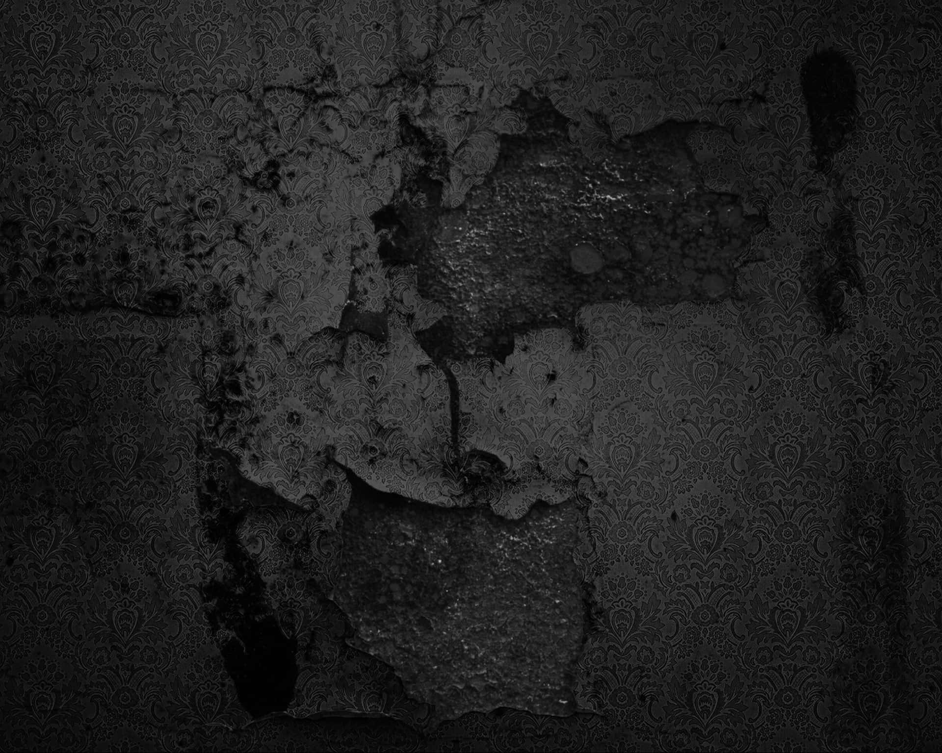 A Black And White Photo Of A Wall With Paint On It