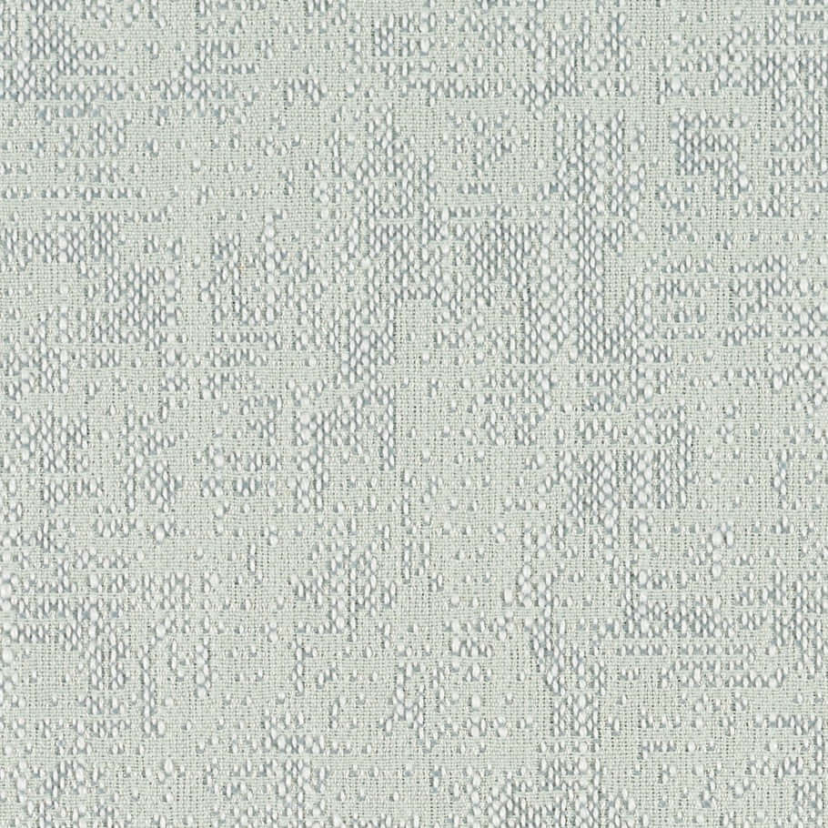 A Light Grey Fabric With A Small Pattern