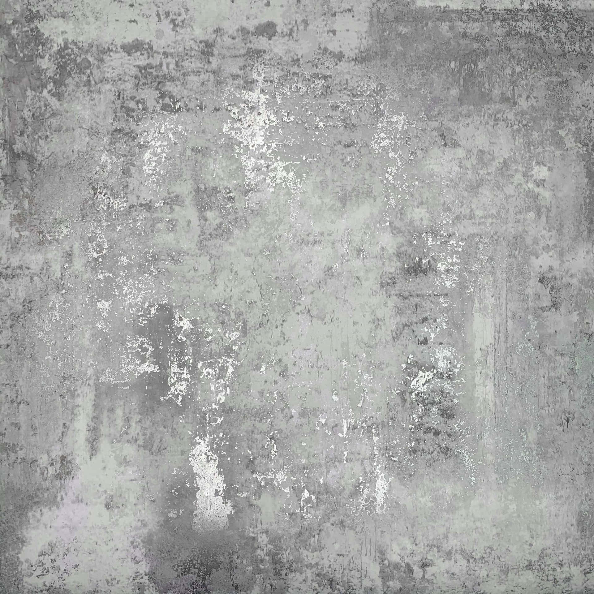 A closeup of a warm grey textured wall