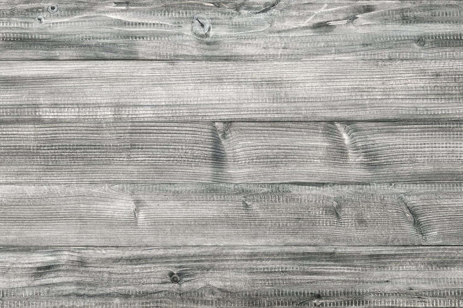 A Gray Wood Background With A White Background