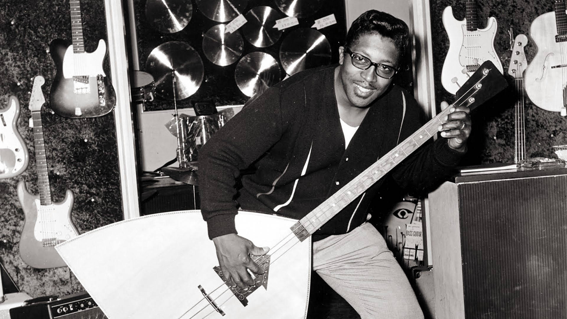 Greyscale Bo Diddley With Big Guitar Wallpaper
