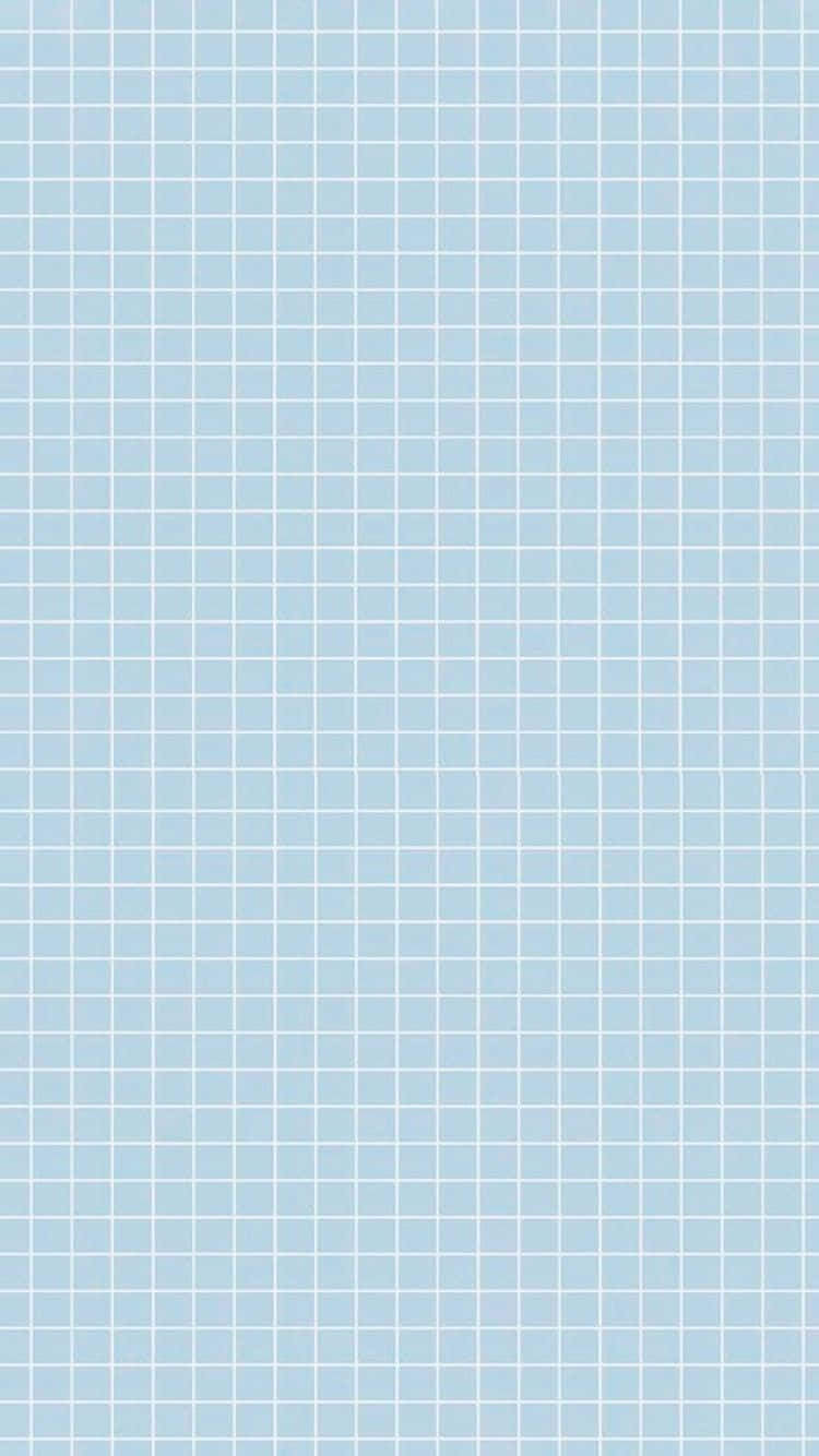 A Blue Grid Paper With White Squares Wallpaper