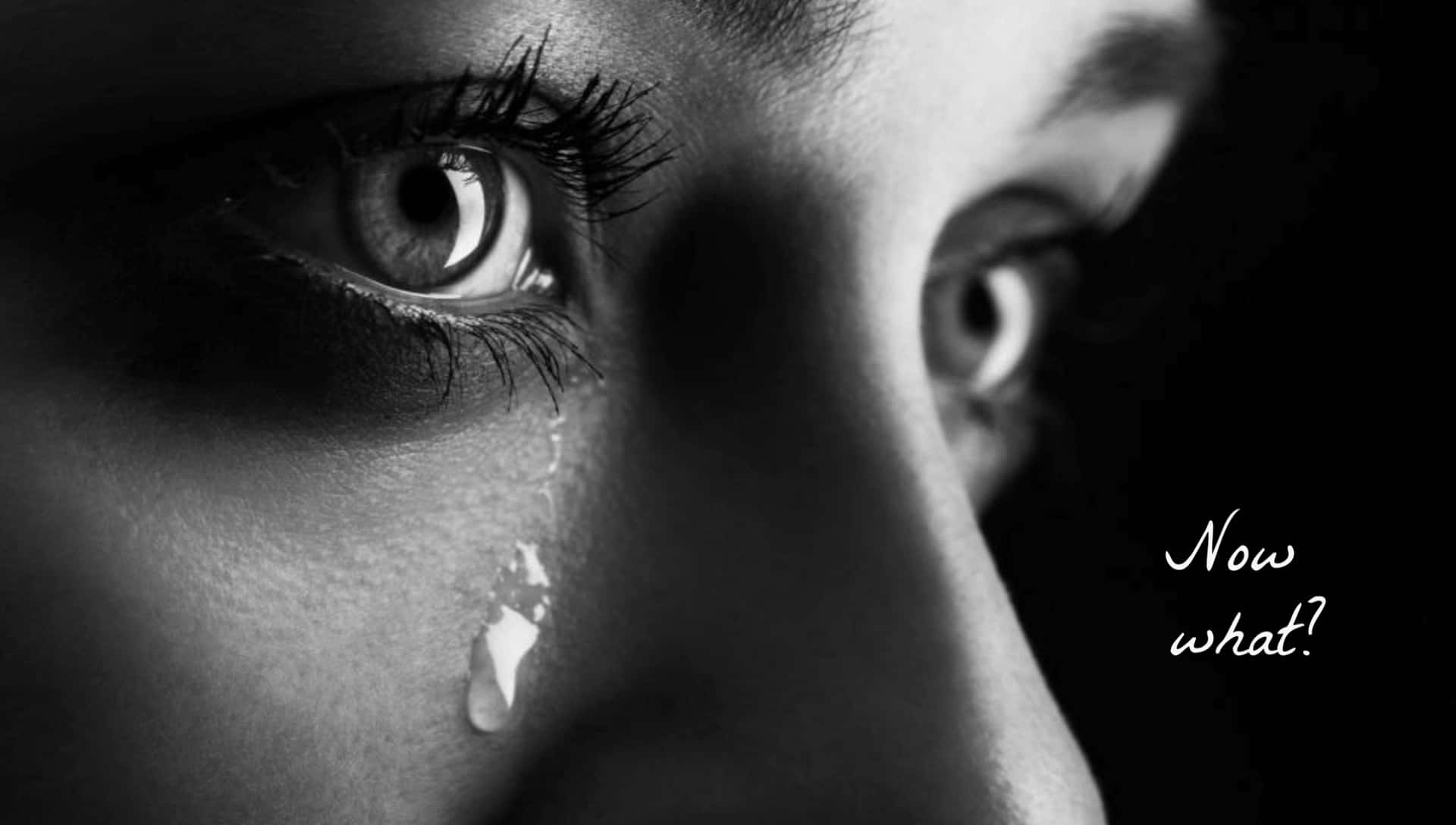 A Woman's Face With Tears On It