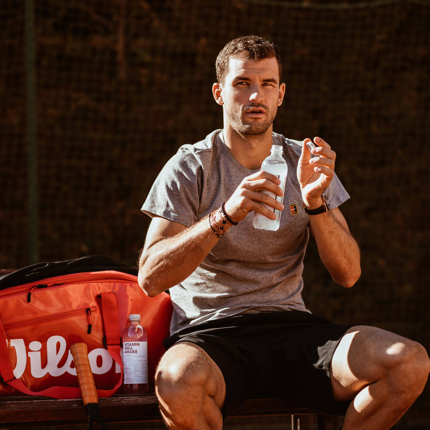 Grigor Dimitrov Sitting With Water Bottle Wallpaper