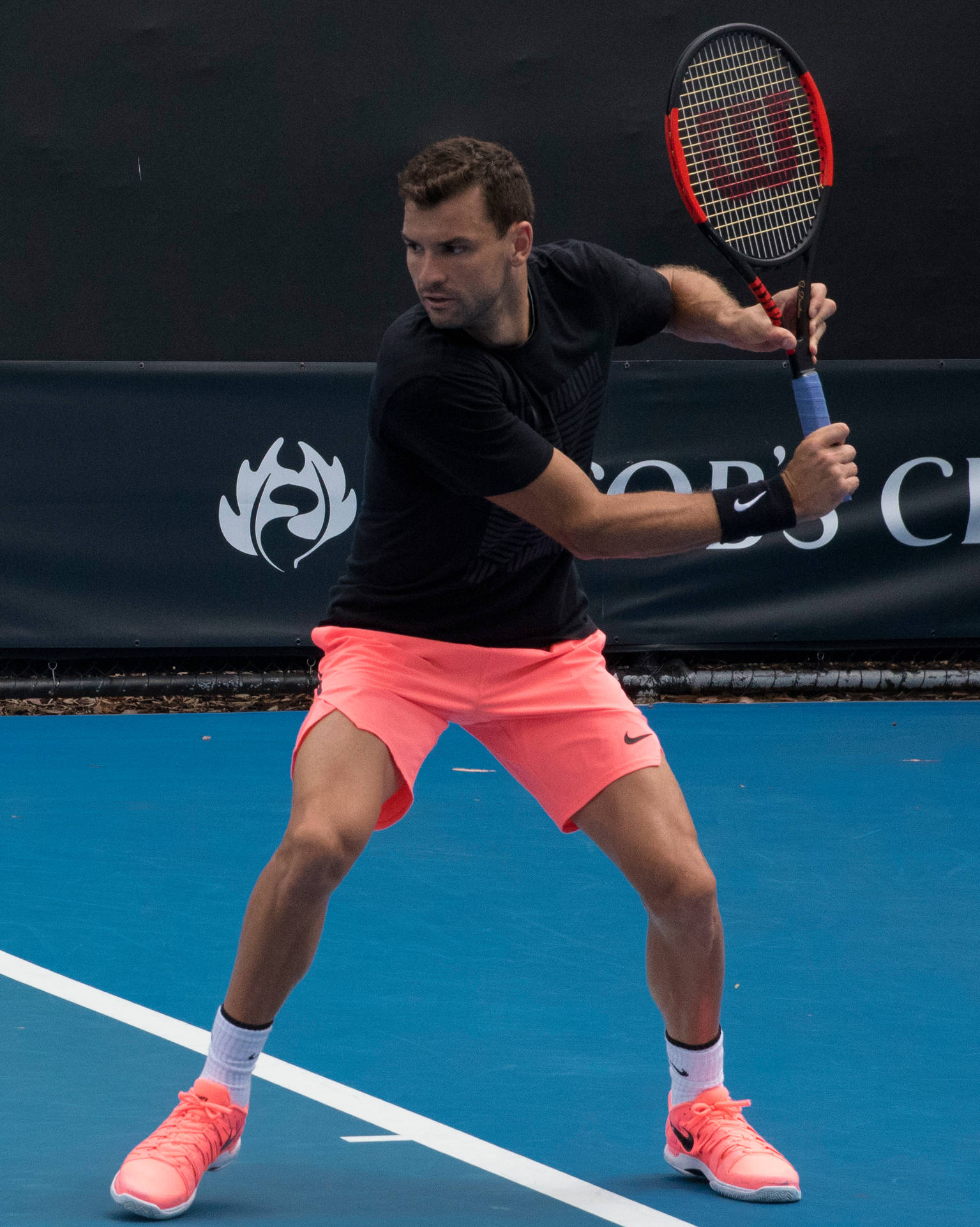 Grigor Dimitrov Wearing Neon Tennis Shorts Wallpaper