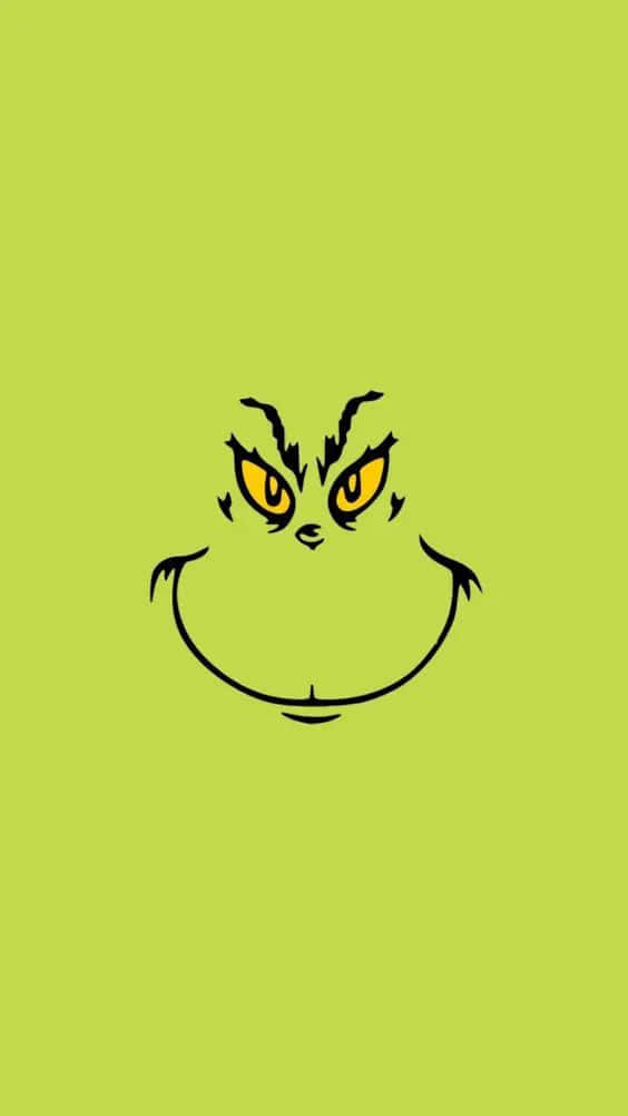 Download The Grinch Face On A Green Background Wallpaper 