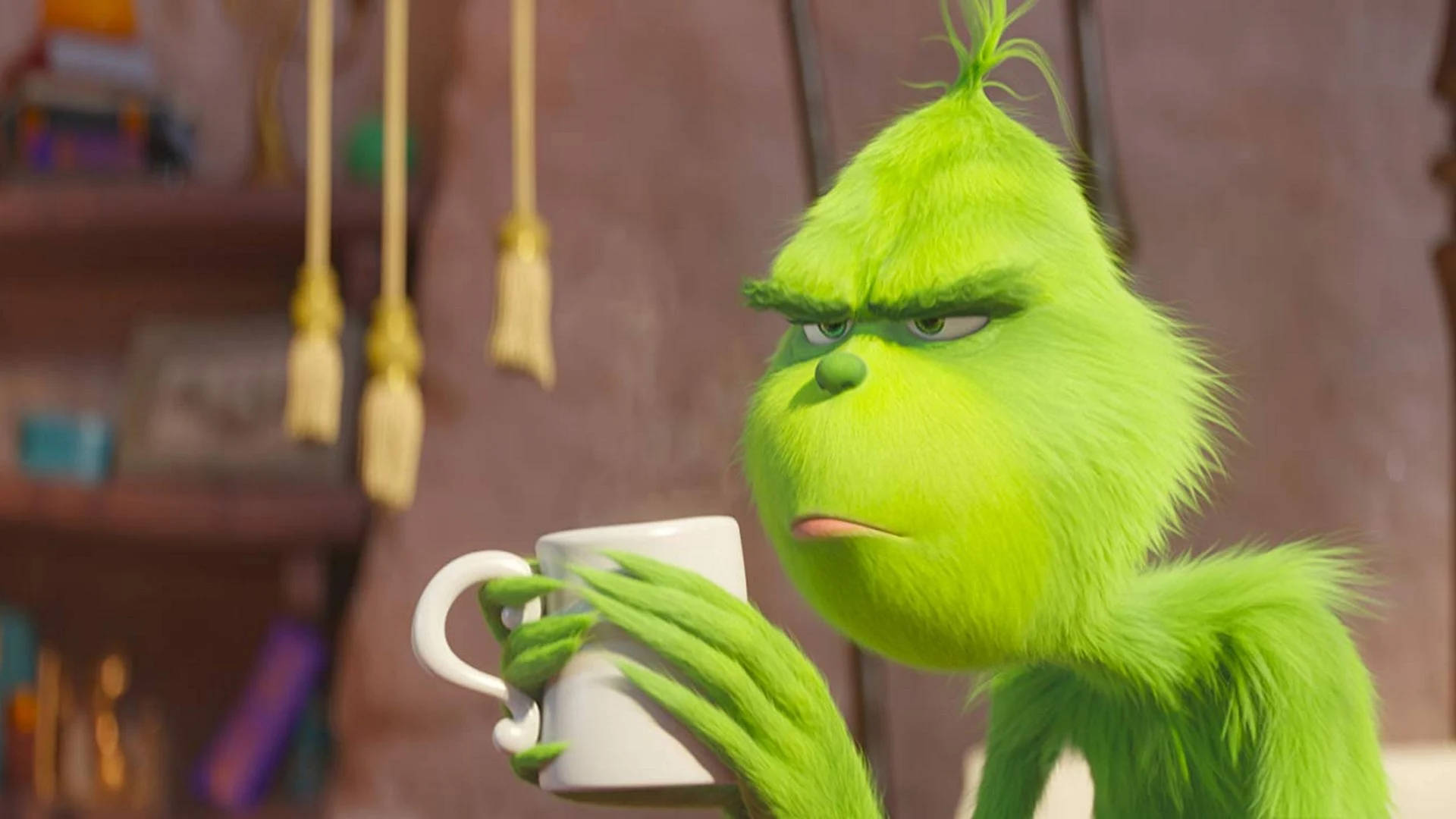 Grinch Holding Coffee Cup Wallpaper