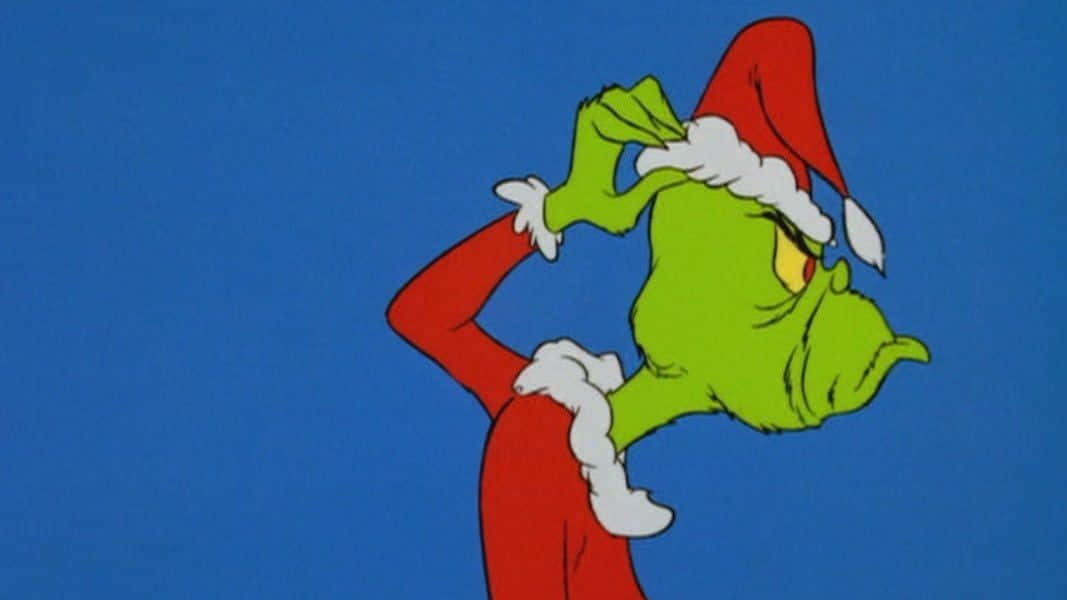 Celebrate the holidays with a Grinch Zoom Background
