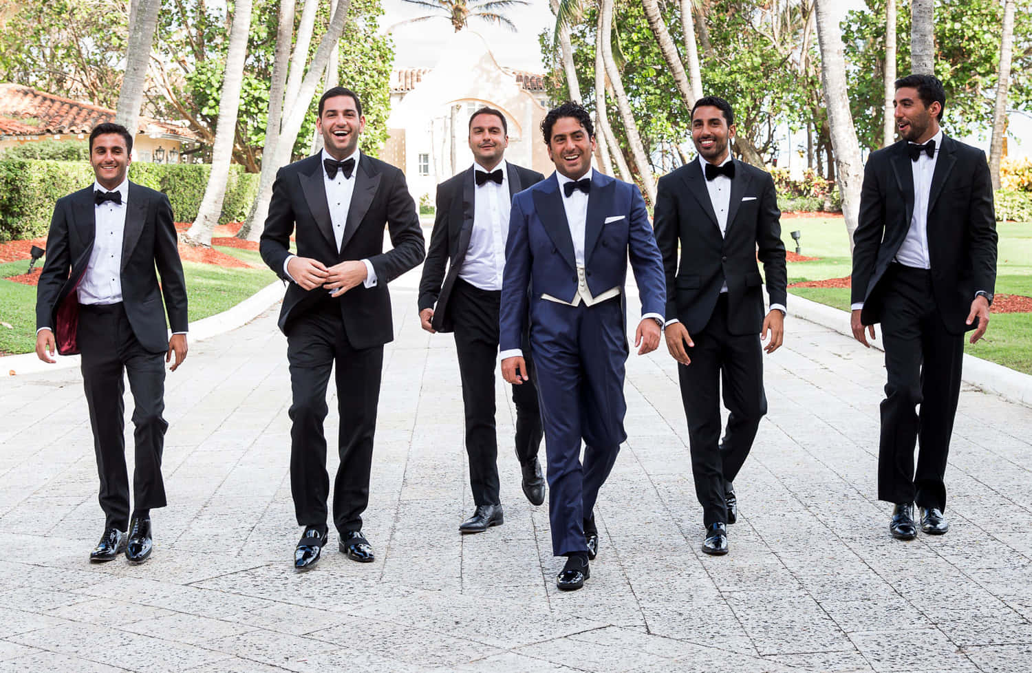A group of groom and his best-men, ready to celebrate the union of their loved ones.