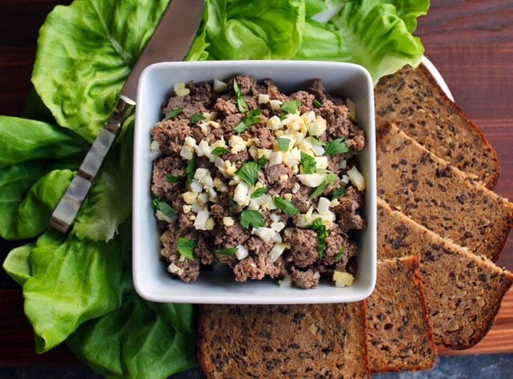 Ground Liver With Onions, Lettuce, And Bread Wallpaper