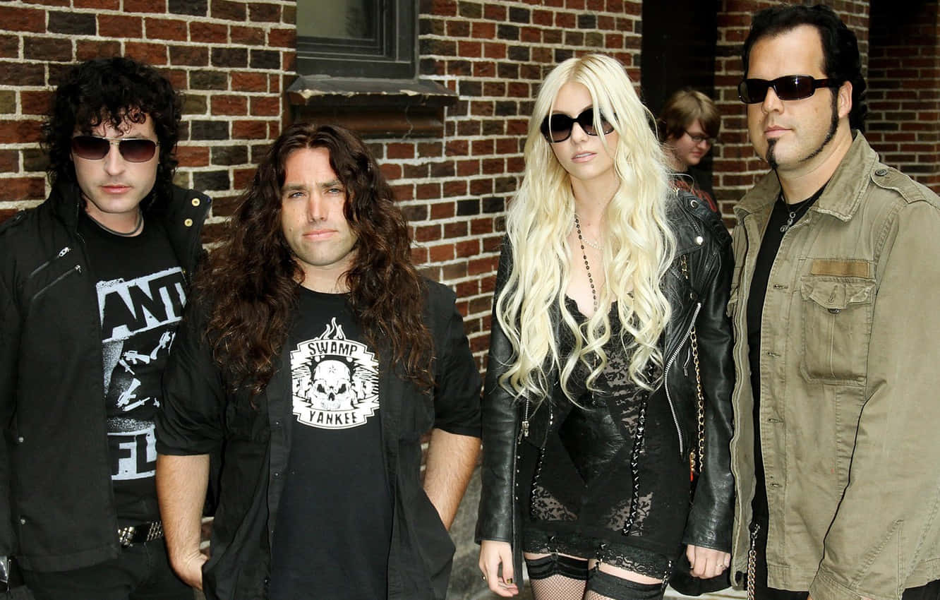 Group Photo Of The Pretty Reckless Band Wallpaper