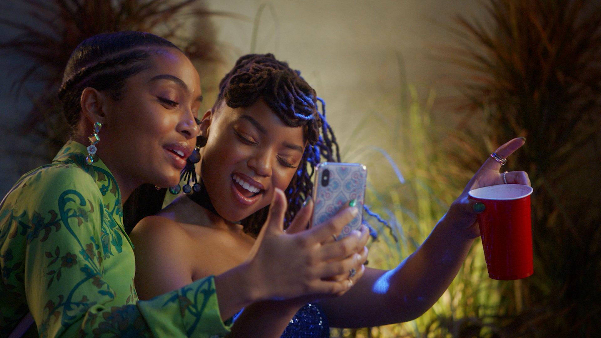 Two Women Taking A Selfie Wallpaper