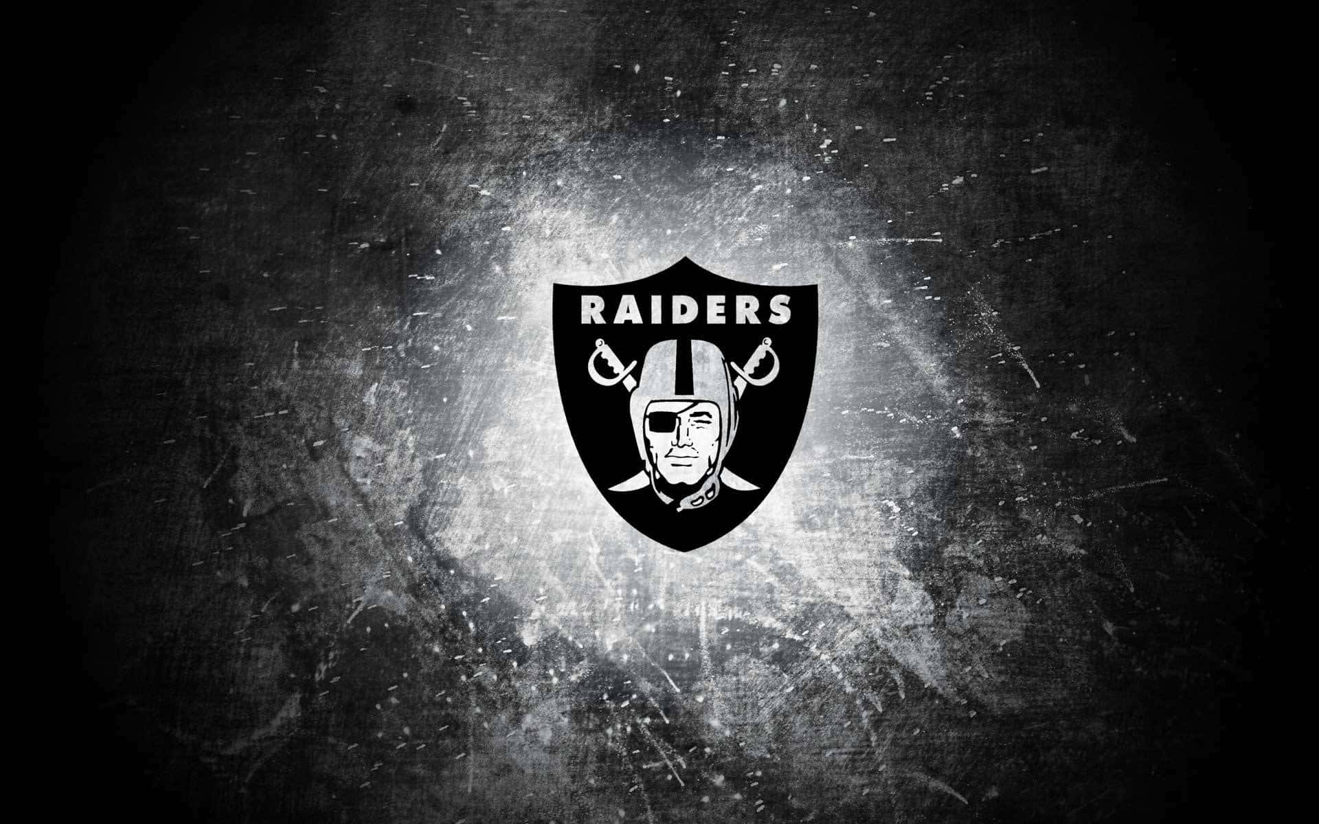 Grunge Raiders Shield Logo Wallpaper