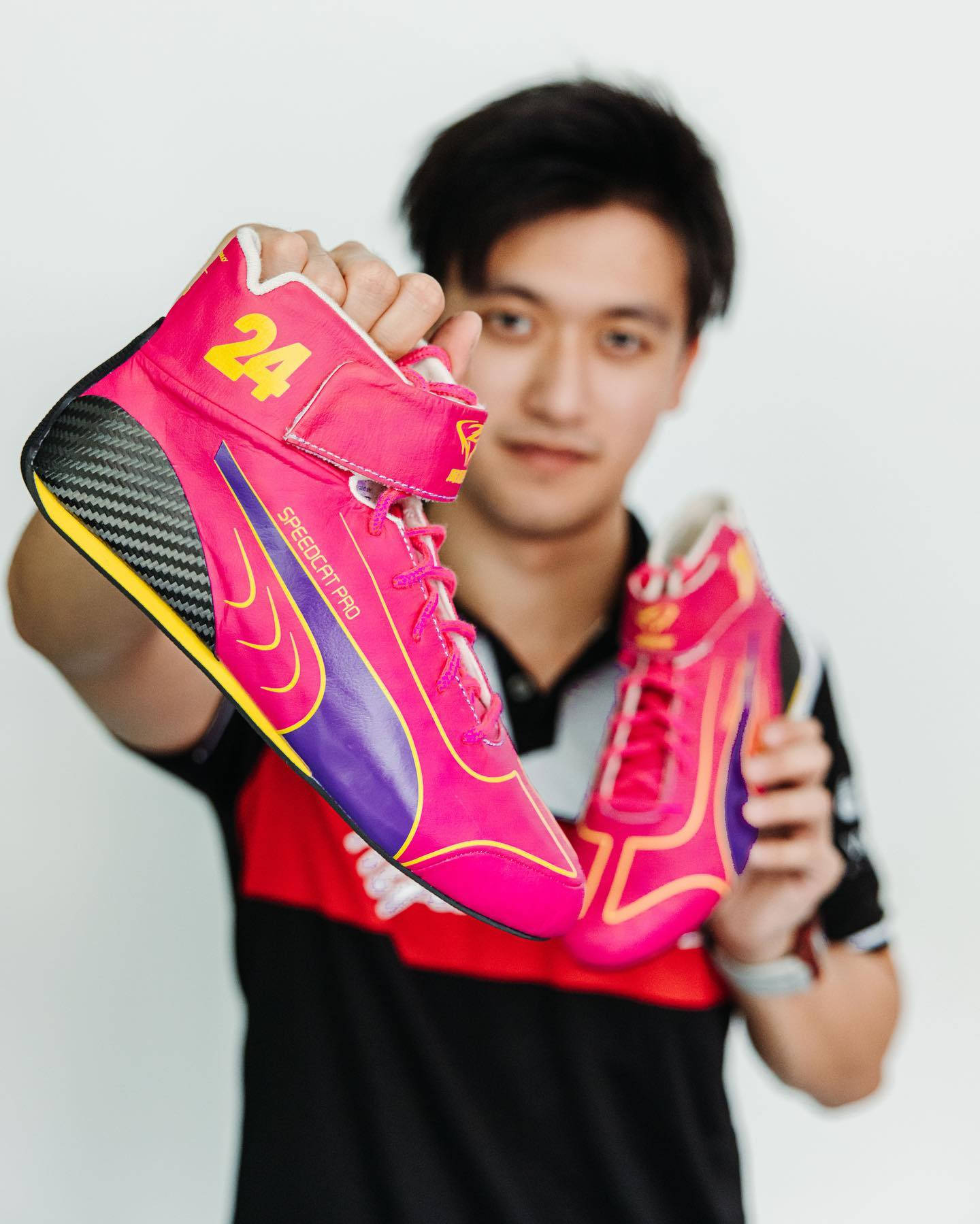 Guanyu Zhou Pink Sneakers Background