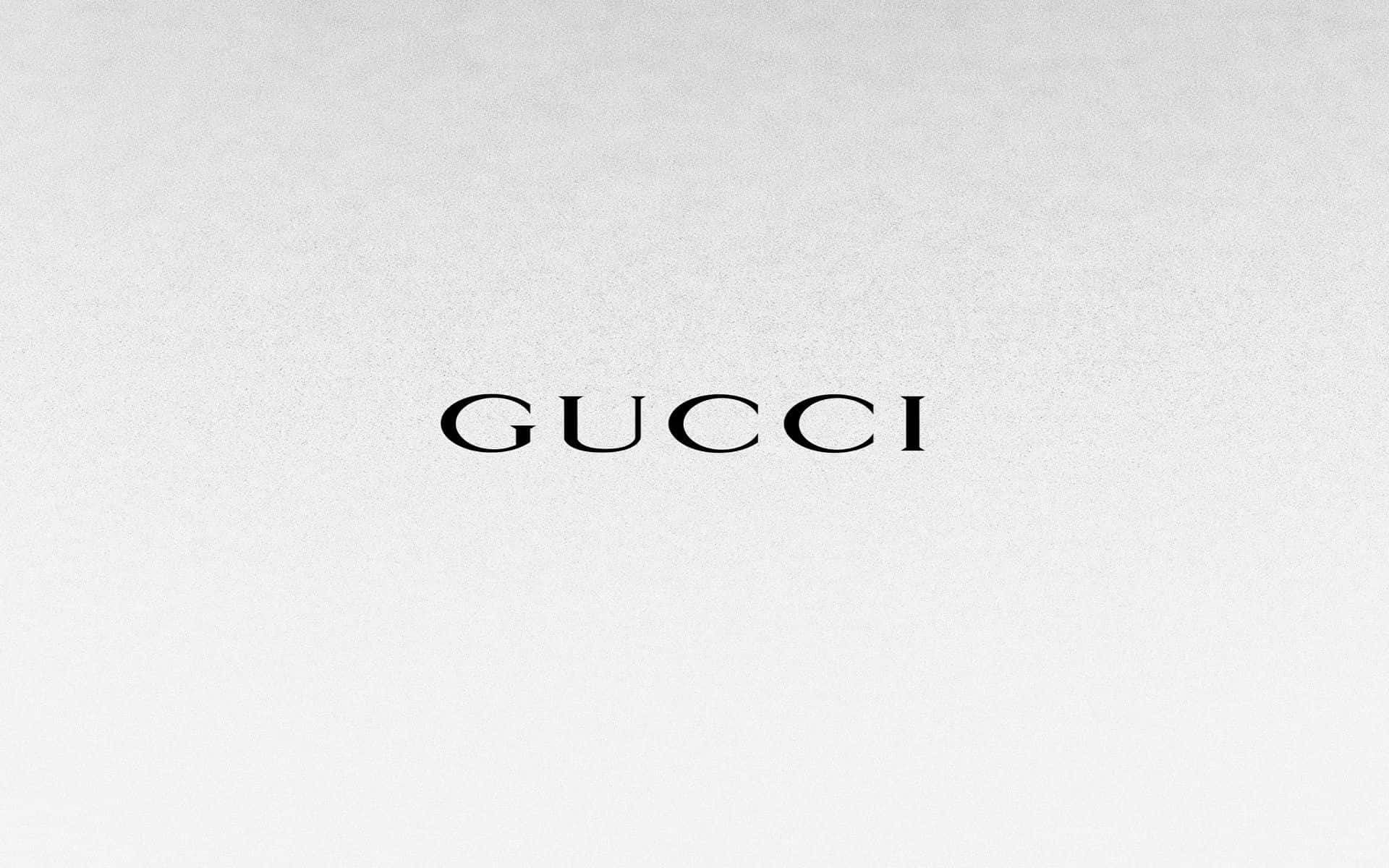 Enkelsvart Bakgrund Med Gucci-text