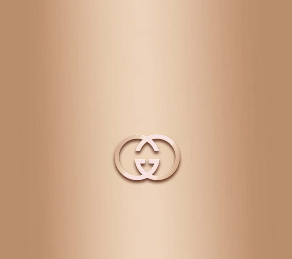 Fondoelegante Con El Logo De Gucci En Dorado Rosa