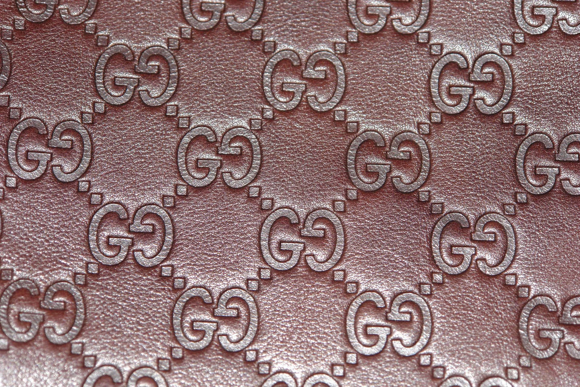 Minimalistrosafärgad Gucci-läderbakgrund