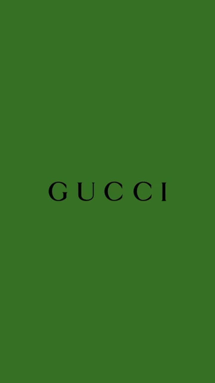 Make your wardrobe stand out with Gucci Green Wallpaper