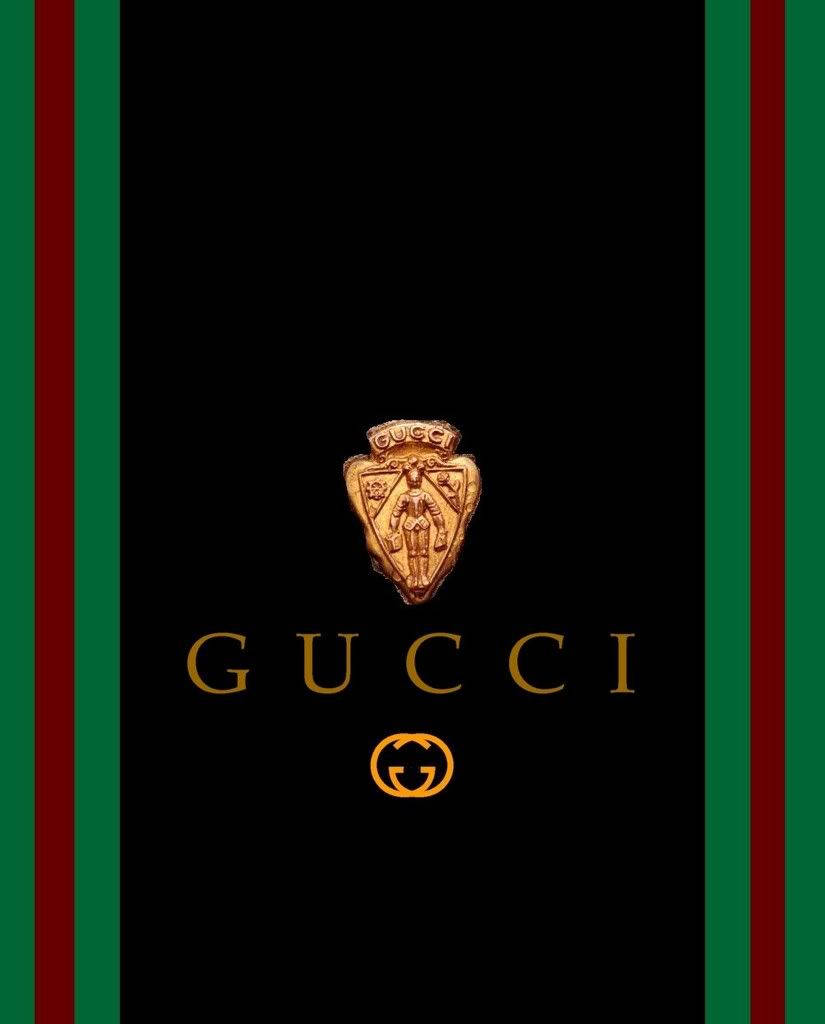 Gucci Logo On A Black Background Wallpaper