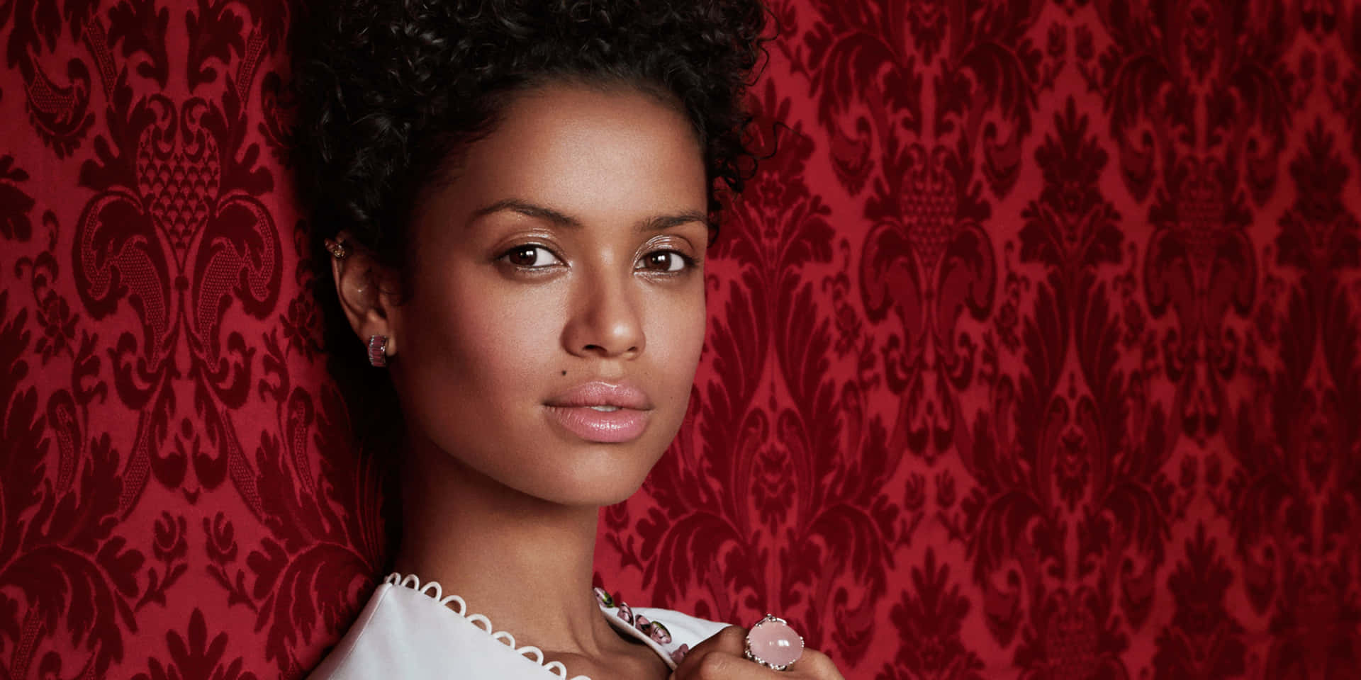 Gugu Mbatha-Raw striking a pose in a stunning photoshoot. Wallpaper