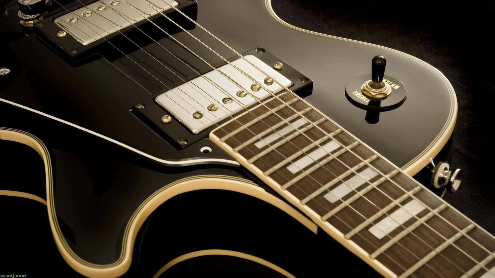 Unamplificador De Guitarra Clásica Que Captura El Icónico Sonido Del Rock. Fondo de pantalla