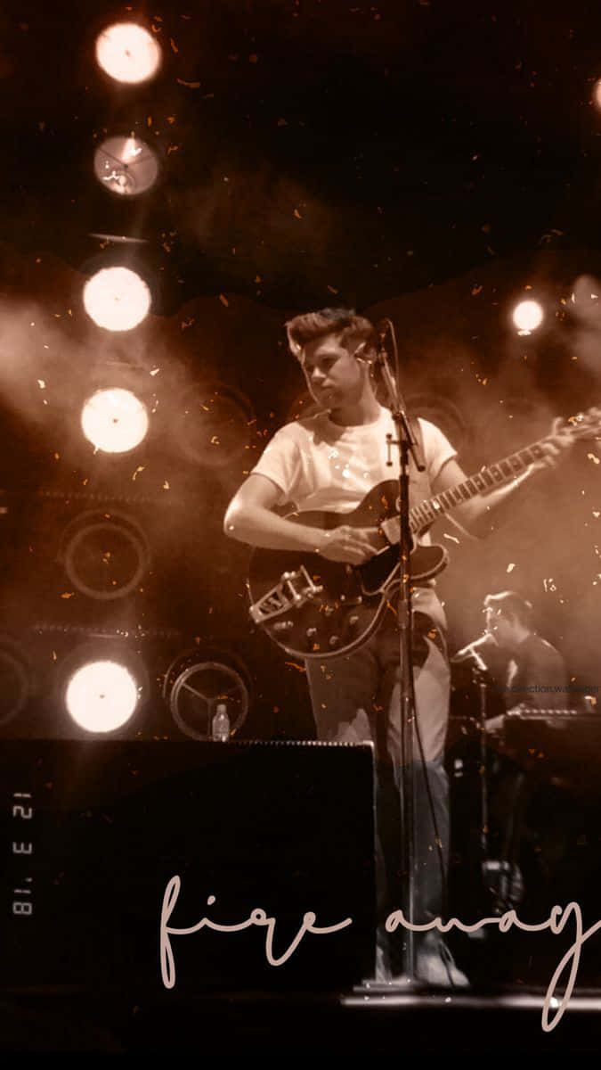 Guitariste Sur Scène 'fire Away' Fond d'écran