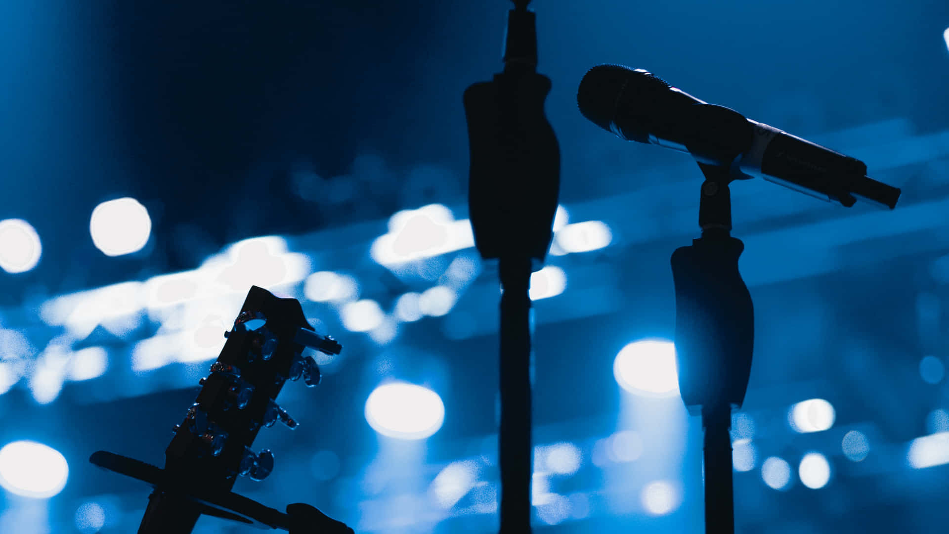 Guitarist's Microphone On The Stage Wallpaper