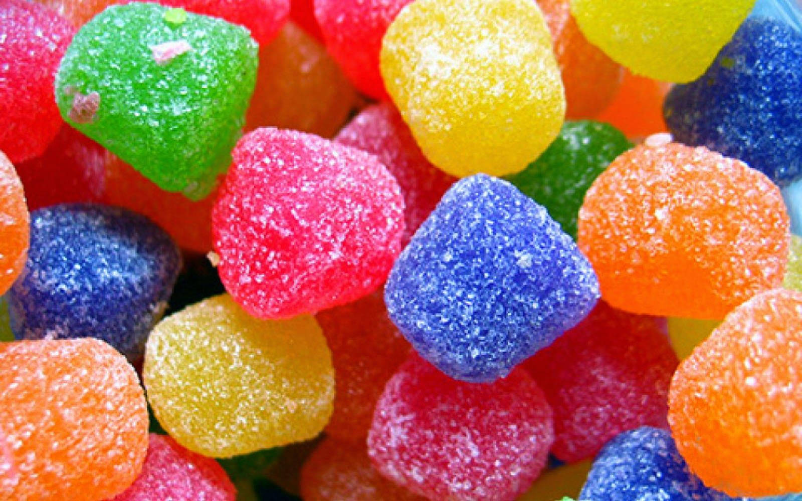 Downloaden Gumdrop Rainbow Bonbons Wallpaper | Wallpapers.com