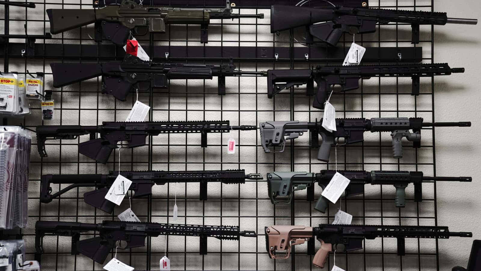 A Display Of Guns On Display In A Store