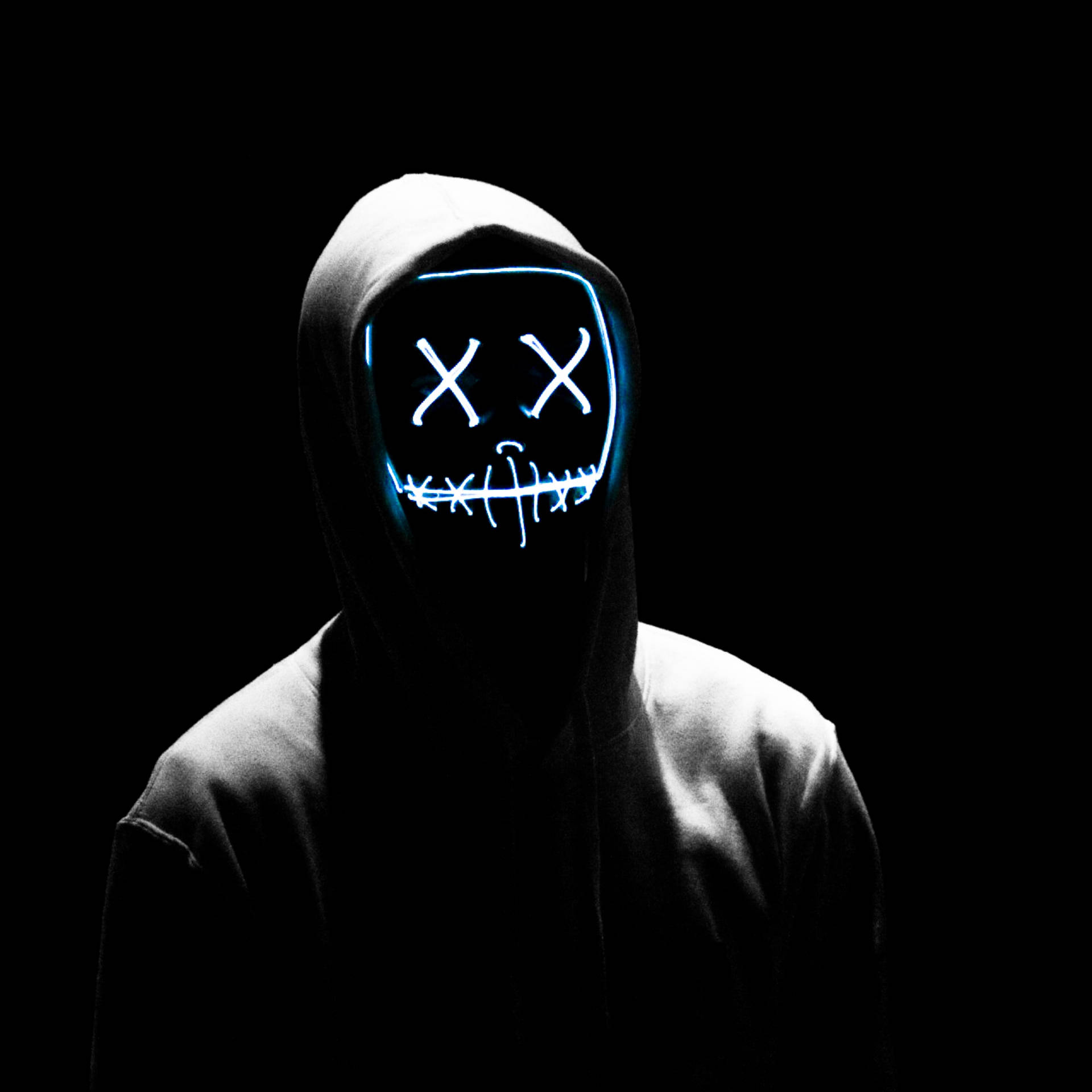 Guy In Neon Purge Mask And Hoodie Wallpaper