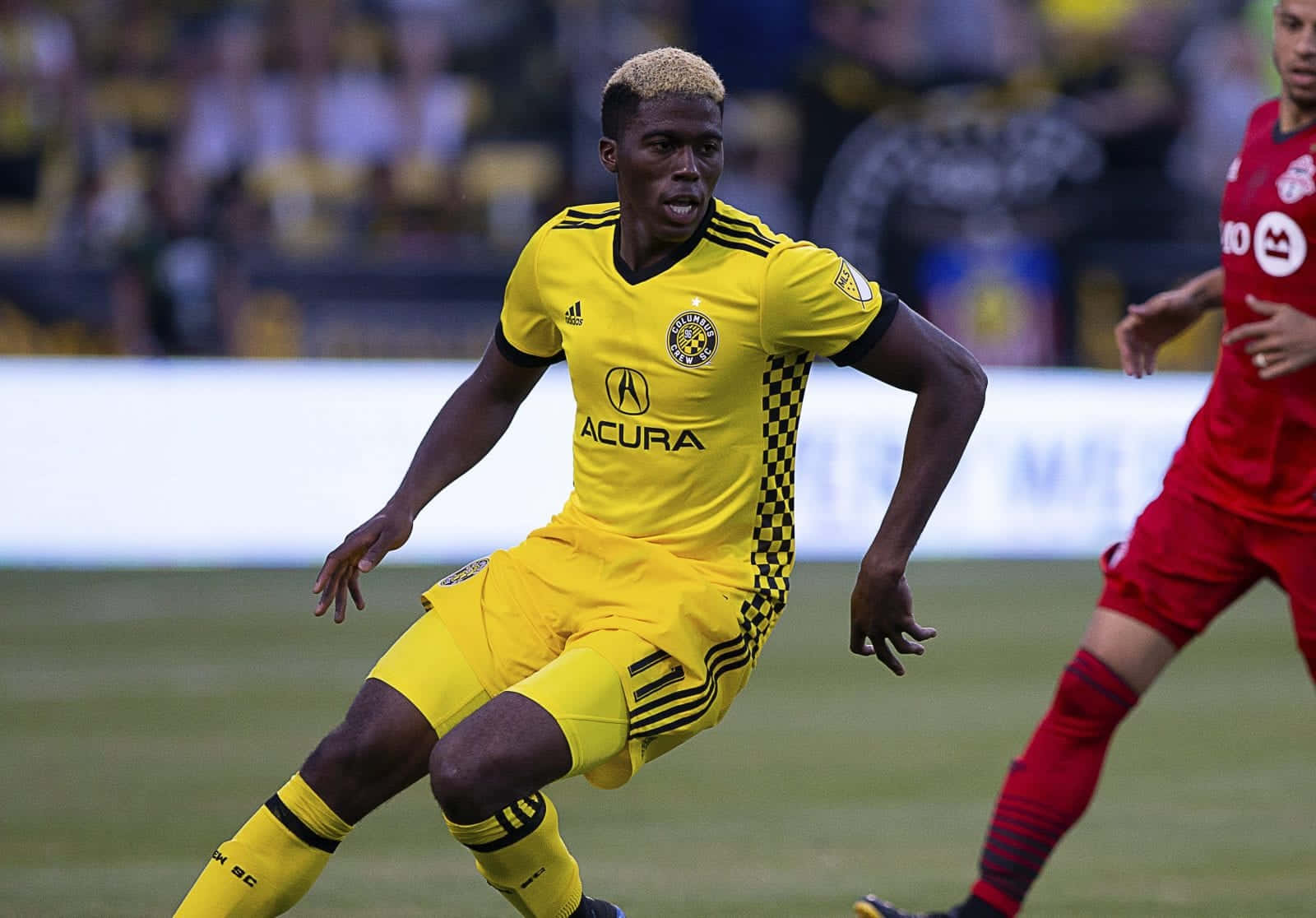 Gyasi Zardes Chases Ball With New York Red Bulls Wallpaper
