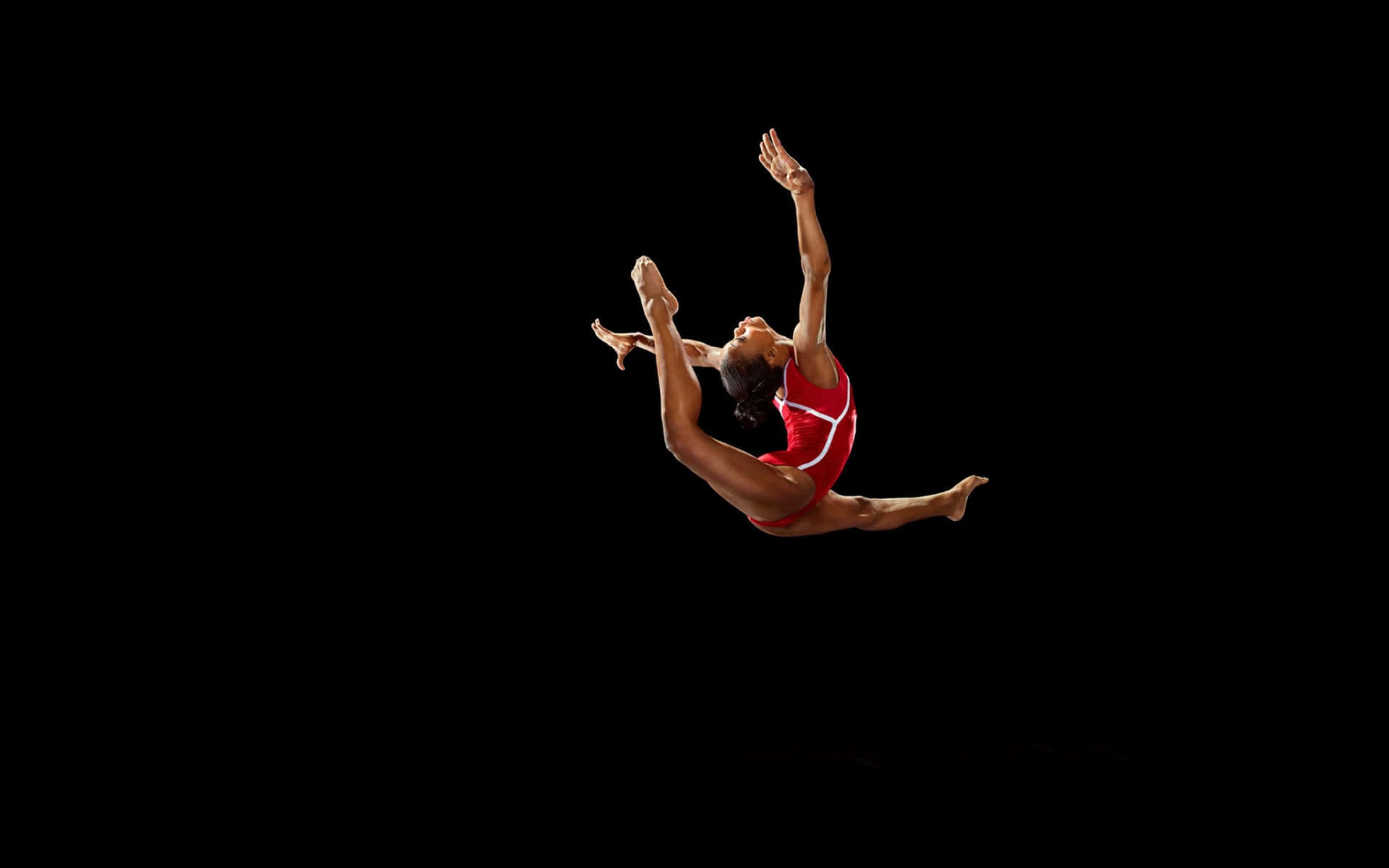 Captivating Gymnast in Mid-Air