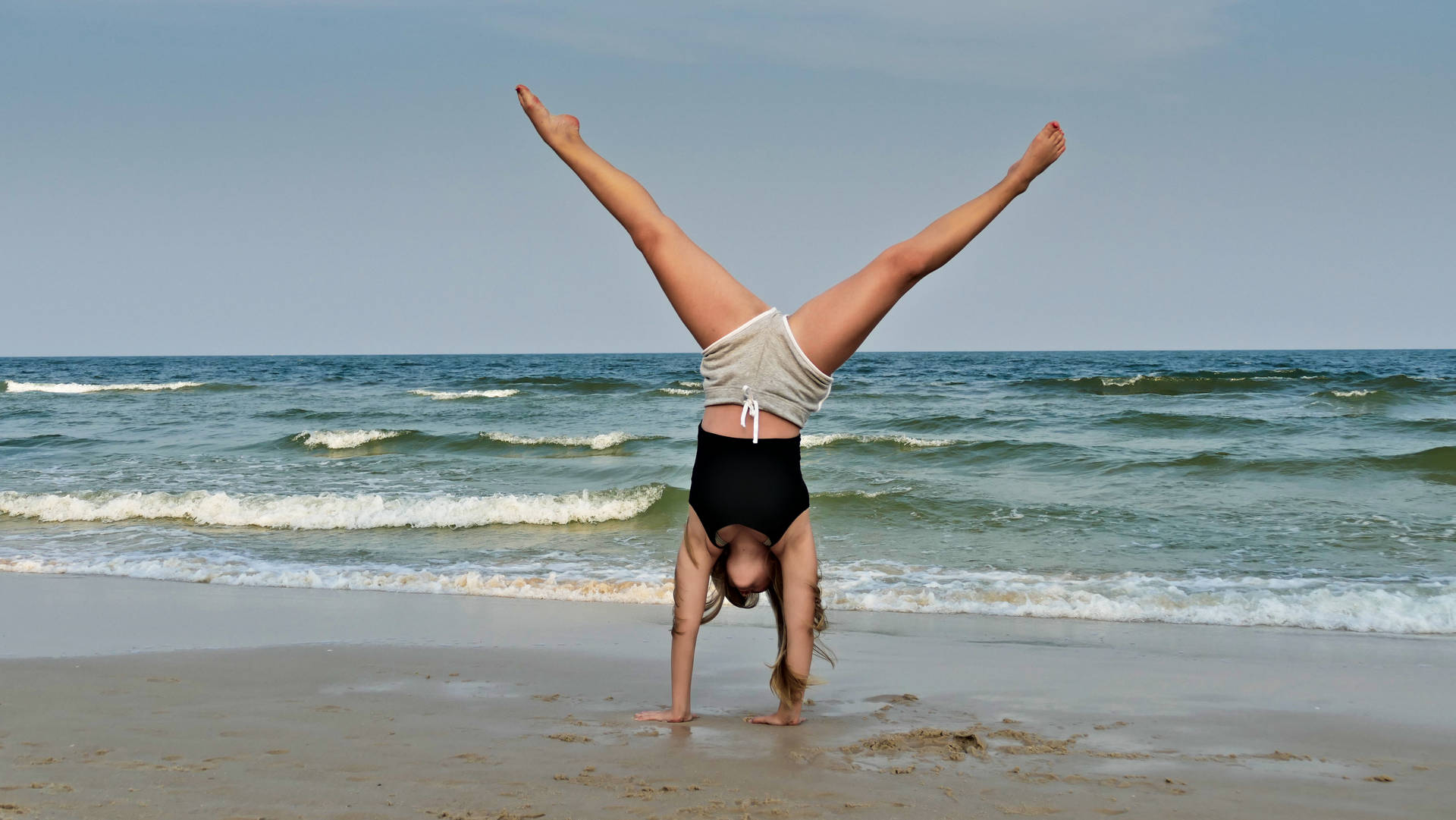 Gymnastics Handstand At Seashore