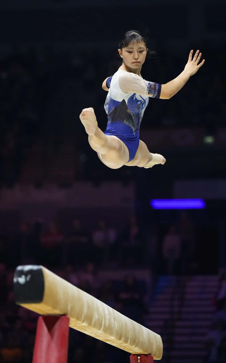 An Athlete in Action During a Gymnastics Routine