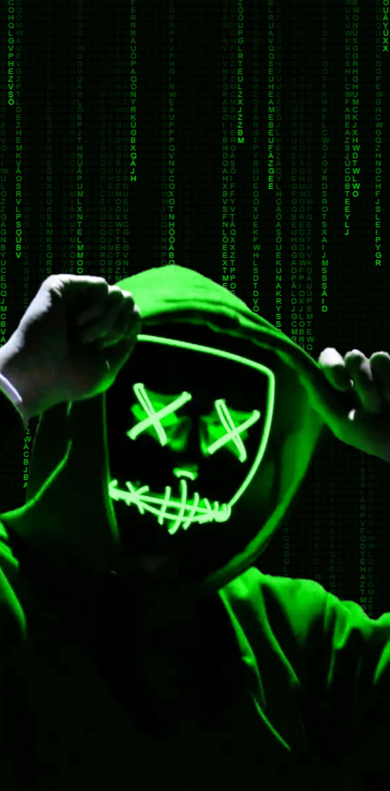Hacker Code iPhone Wallpaper — A hooded figure with glowing green stitched face mask stands against a falling green digital code background.