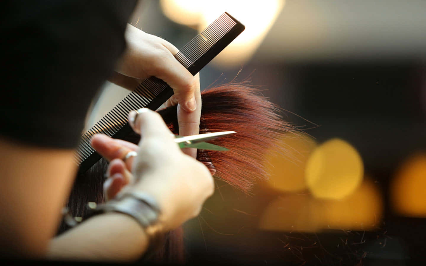 A Woman Cutting Hair