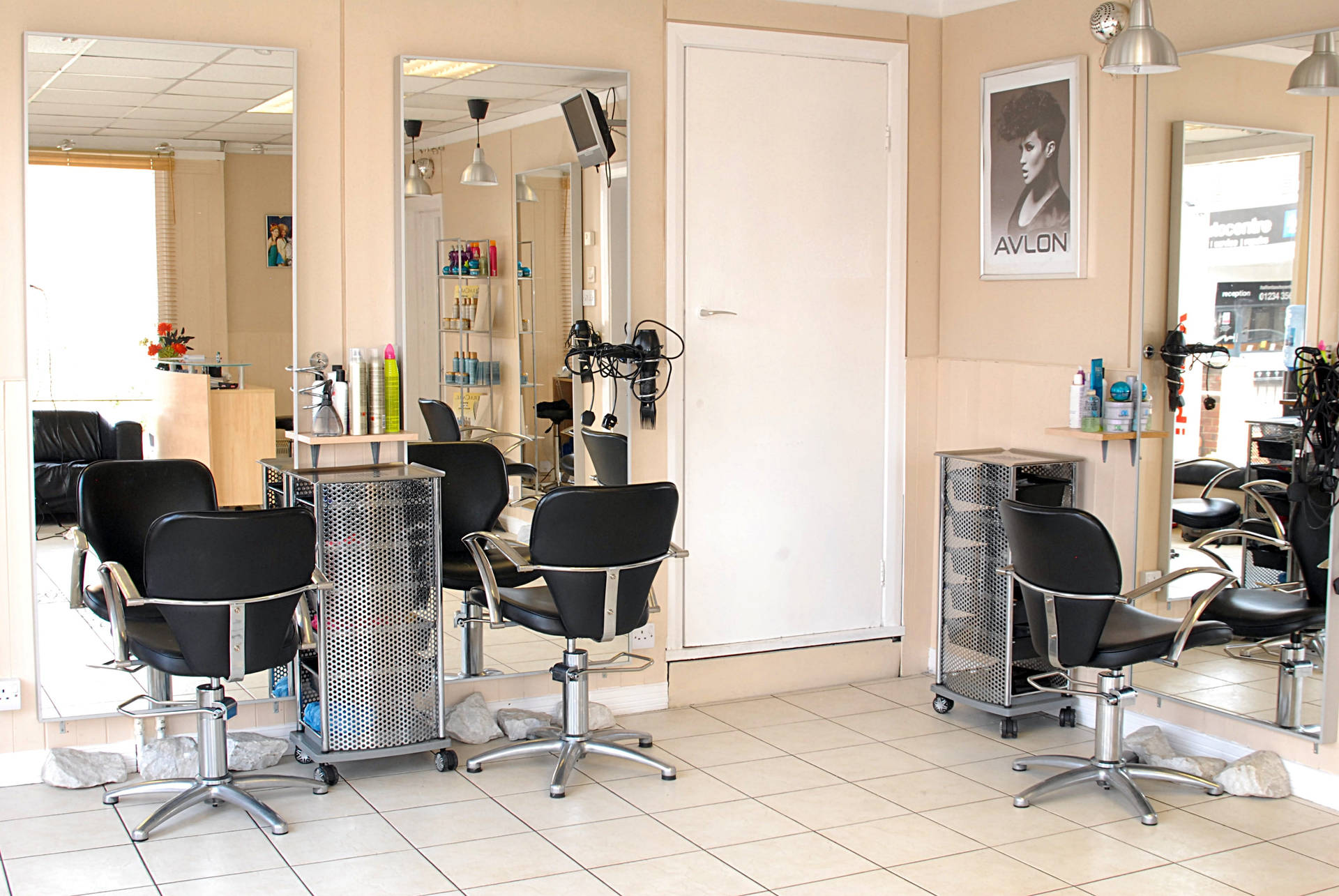 Hair Salon With Black Rolling Arm Chair Wallpaper