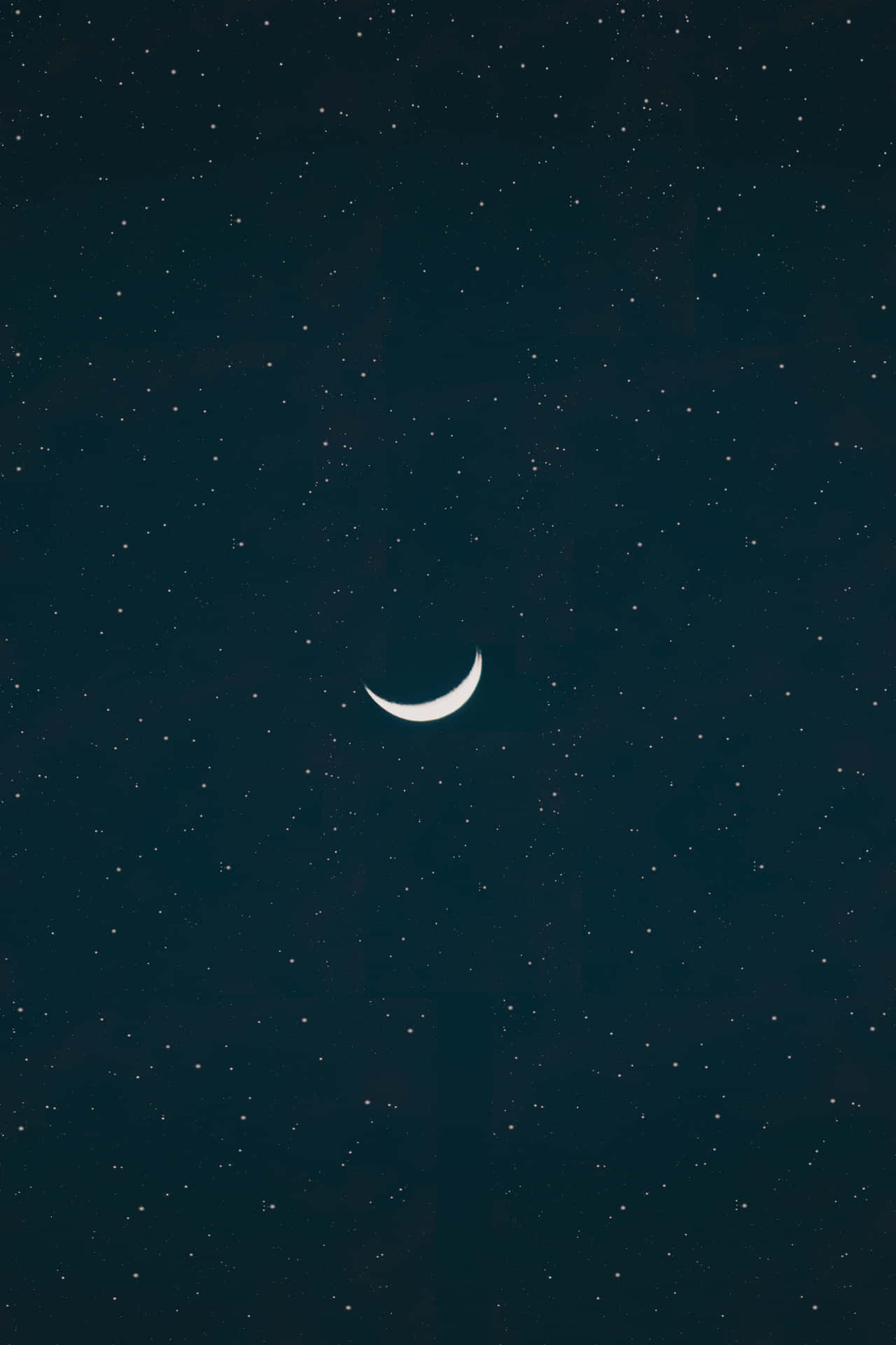 A Crescent In The Sky With Stars Wallpaper