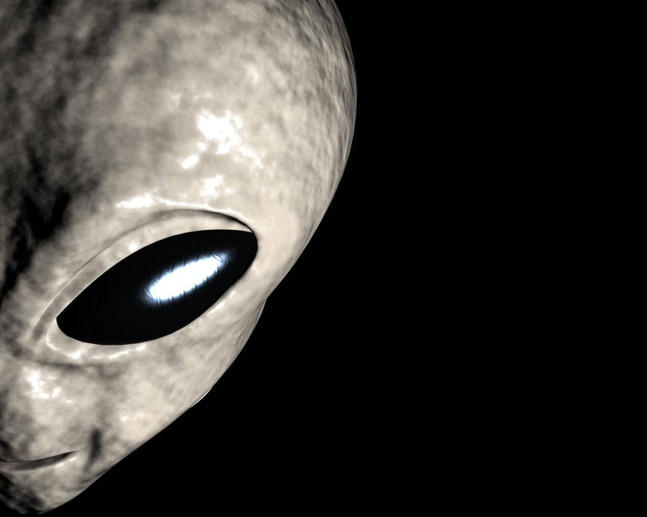 Alien in Half-Mask Illuminated by Glaring Lights Wallpaper