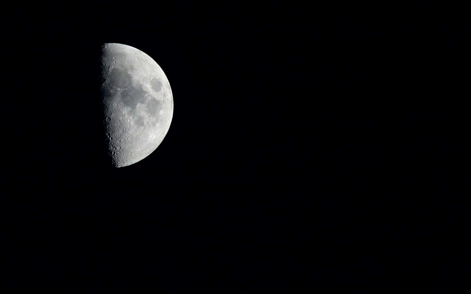 Take a Moment to Admire the Enchanting Beauty of a Half Moon