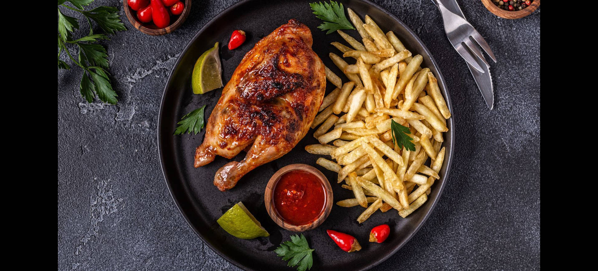 Sizzling Half-Roasted Peri Peri Chicken with French Fries Wallpaper