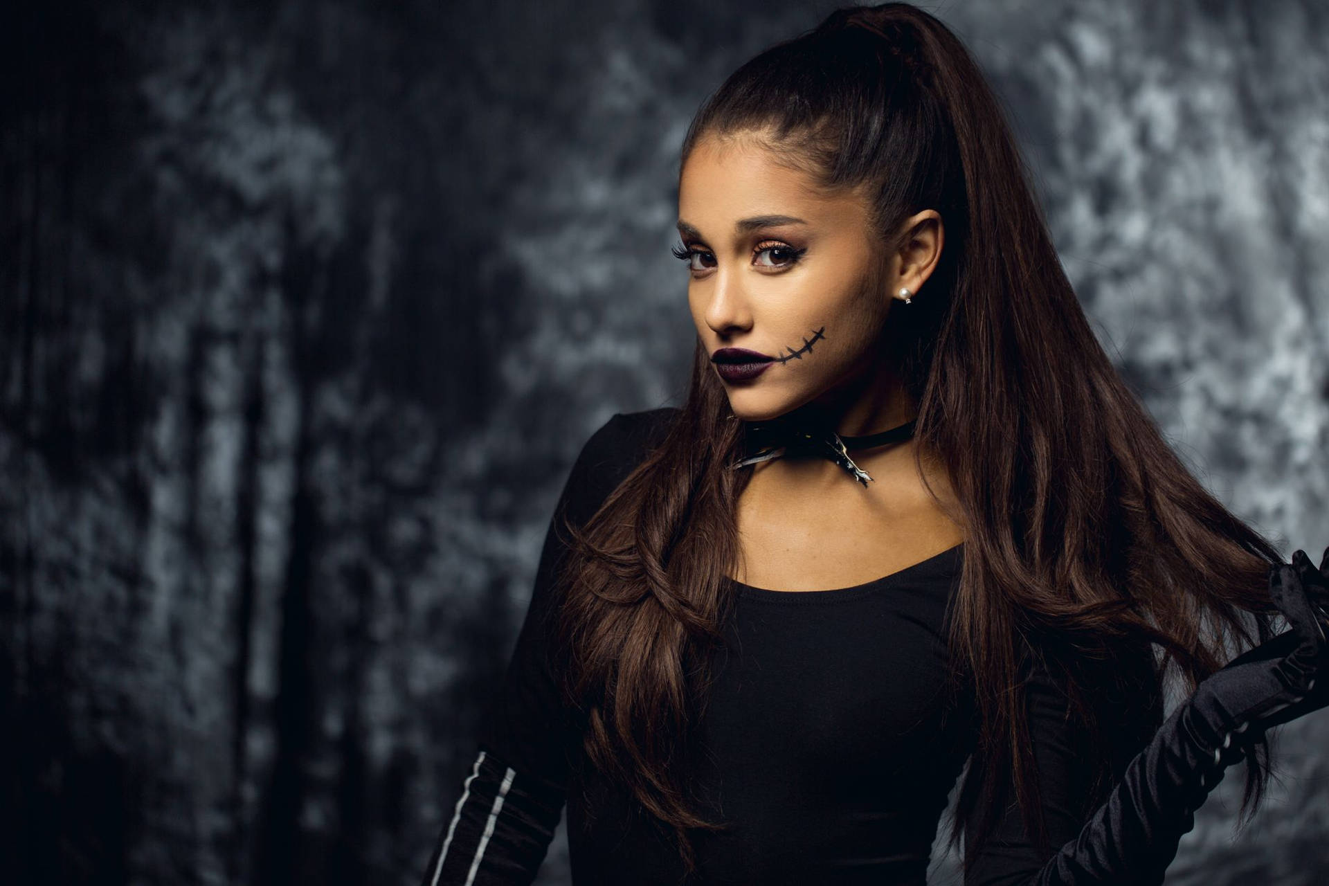 Make a statement this Halloween with Ariana Grande's chic witchy look! Wallpaper