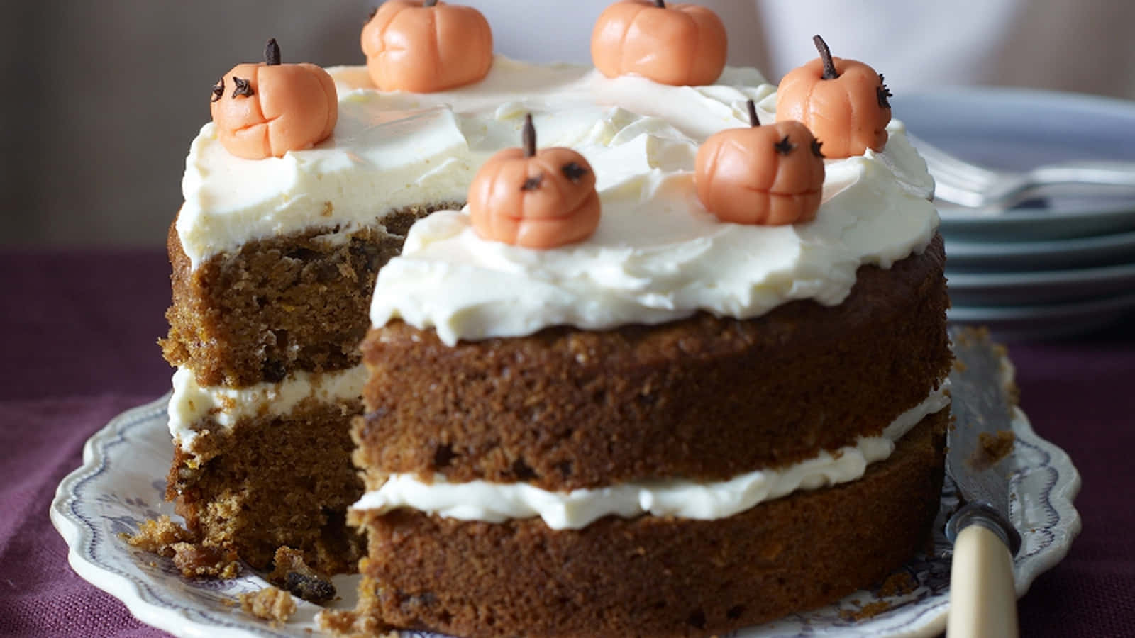 Delicious Halloween Cake with Pumpkins and Chocolate Wallpaper