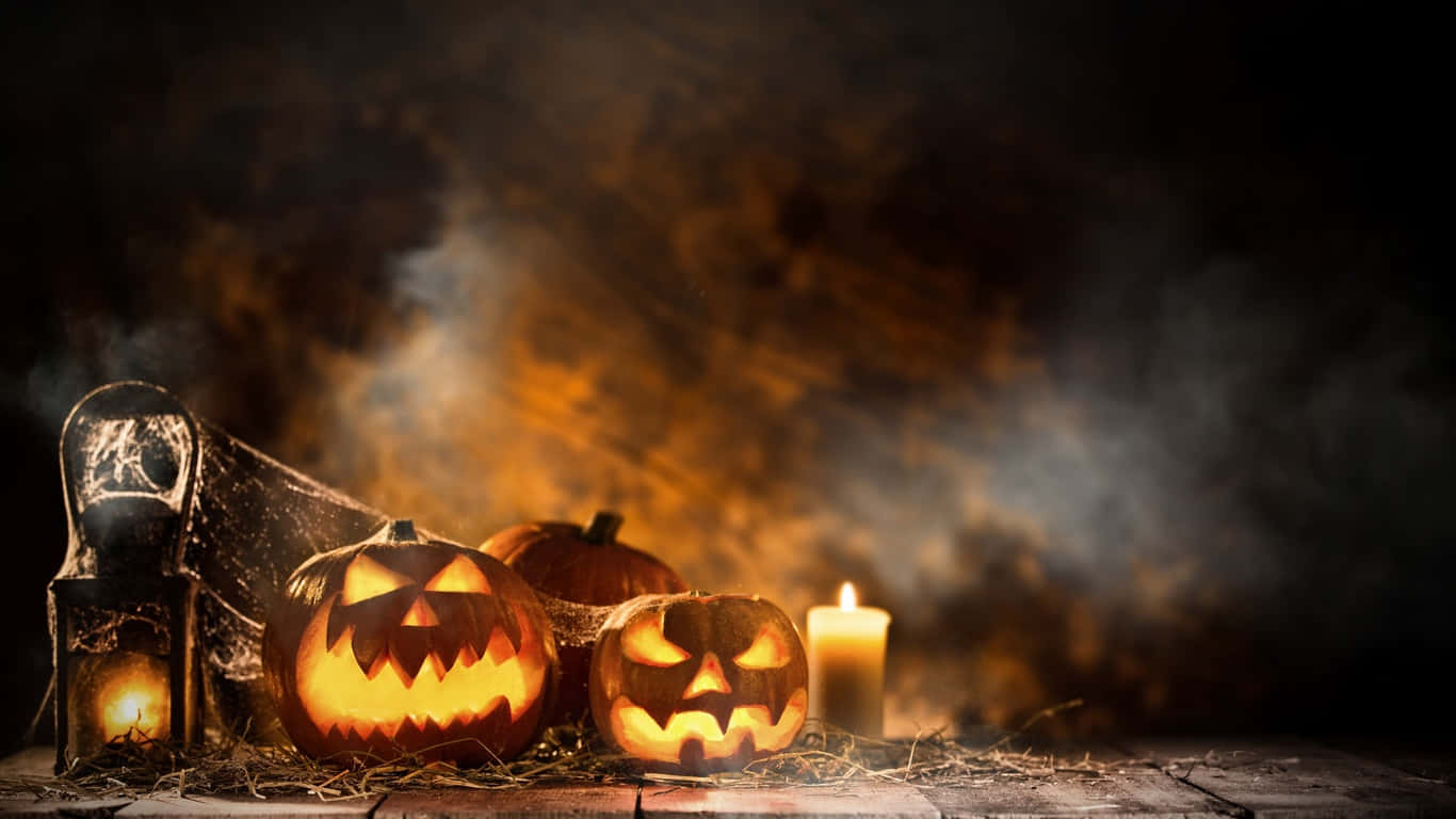 Illuminate your Halloween night with these spooky candles! Wallpaper