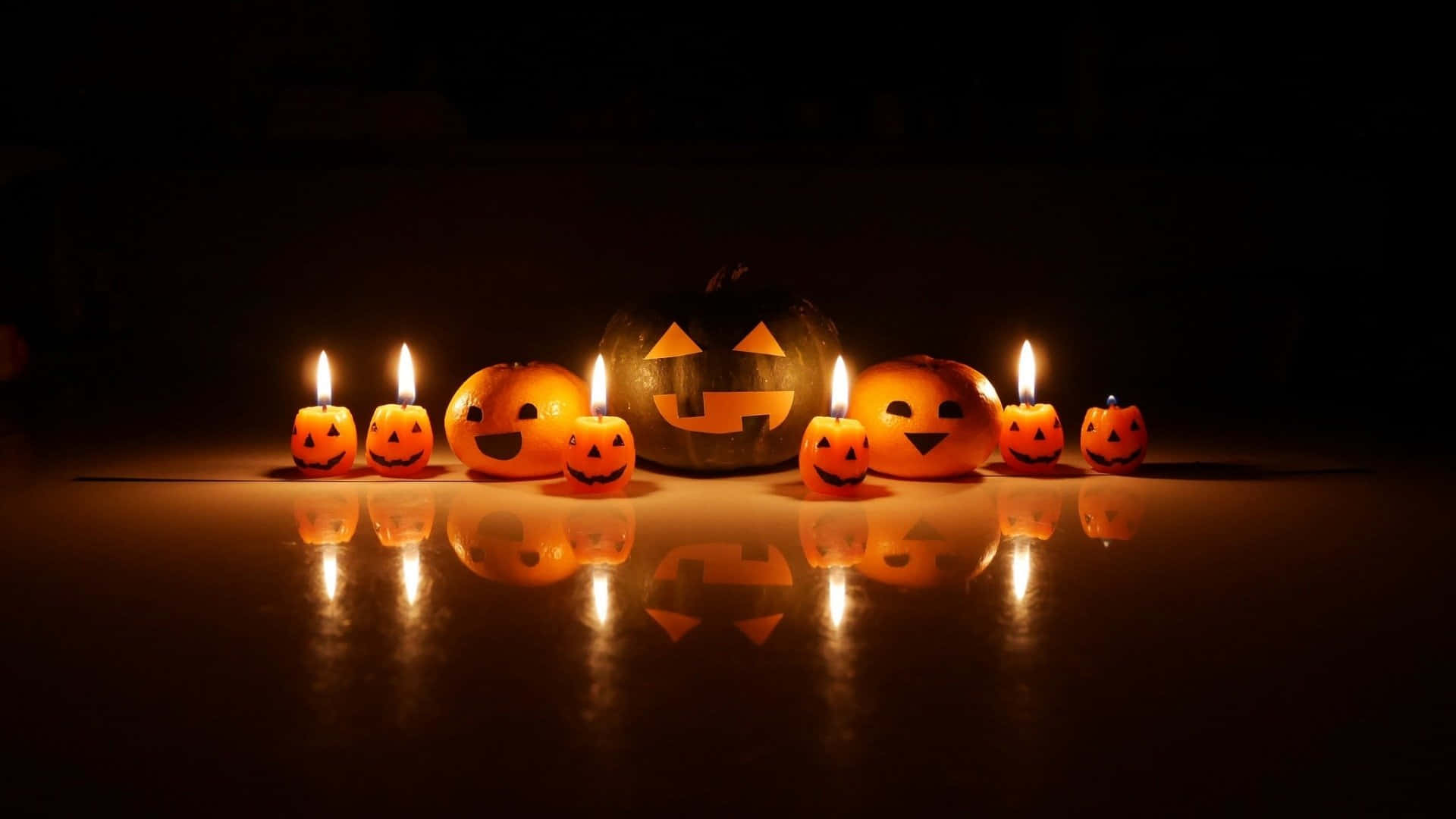 Celebrate Halloween with these Magical Candles Wallpaper